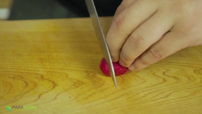 Slice the radish into thin (1mm) slices, then into thin sticks.