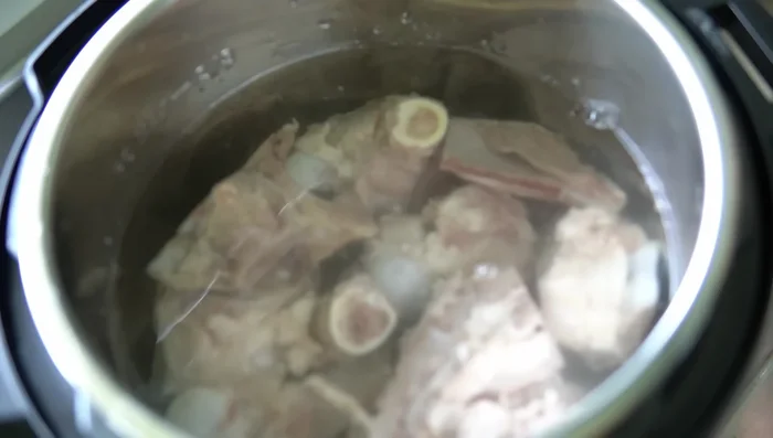 Pressure cook bones in water for 1 hour on high.