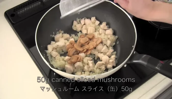 Add canned sliced mushrooms (or fresh ones) and 8 tablespoons of ketchup. Cook together.