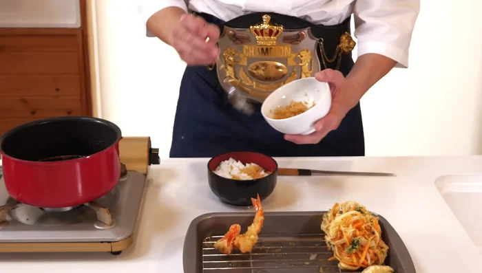 Assemble Tendon: Place rice in a bowl. Layer with kakeage, prawns, vegetables, and drizzle with tare sauce. Garnish as desired.
