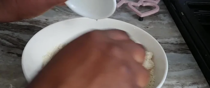 Add gari, mixing to coat with the stew. Add more stew if necessary to achieve your desired consistency.
