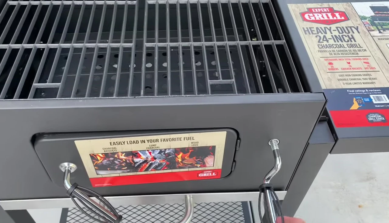 Adjustable charcoal tray