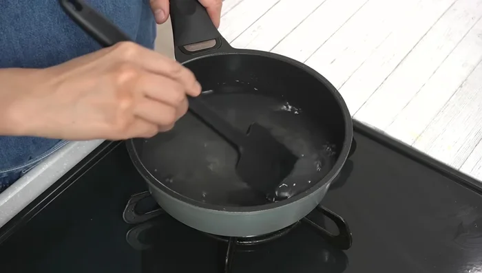 In a pot, mix adzuki beans, water, flour, and salt until well blended. Avoid lumps.