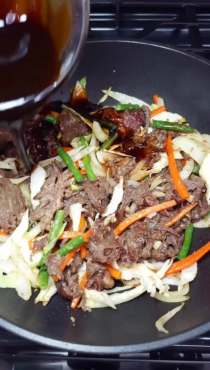 Pour in the remaining teriyaki sauce and toss everything together. (Start: 95)