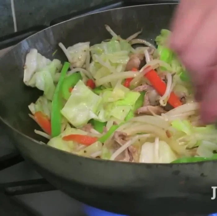 Add salt, pepper, and soy sauce; stir quickly.