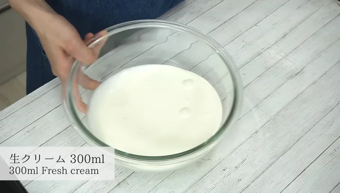 Whip cream in a bowl over ice water until stiff peaks form. Cover and refrigerate until ready to use.