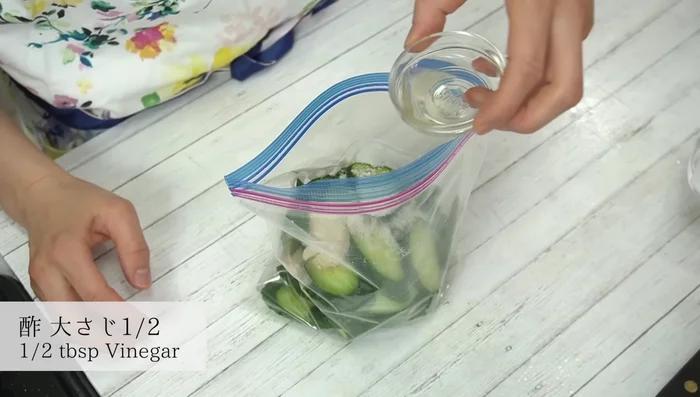 Combine ingredients in the Ziploc bag: Add the cucumber, sugar, salt, vinegar, soy sauce, and wasabi.