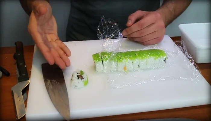 Remove the end pieces. The presenter prefers to discard or eat the end pieces, which are less visually appealing, to give only the best-looking center slices.