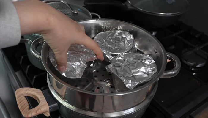 Steam the chawanmushi until set and jiggly.