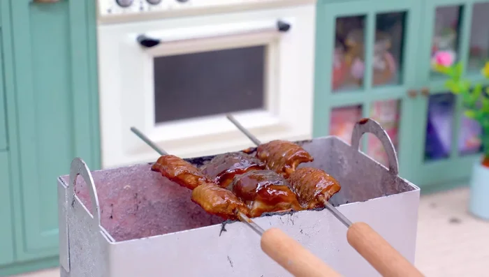 Take the eel off the grill.