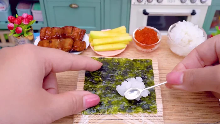 Place rice on a sheet of seaweed.