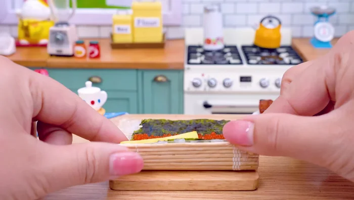 Roll the sushi.