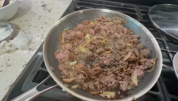 Add the prepared sauce to the beef and stir-fry.