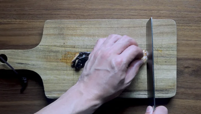 Remove the crispy skin carefully; slice into thin strips and set aside.