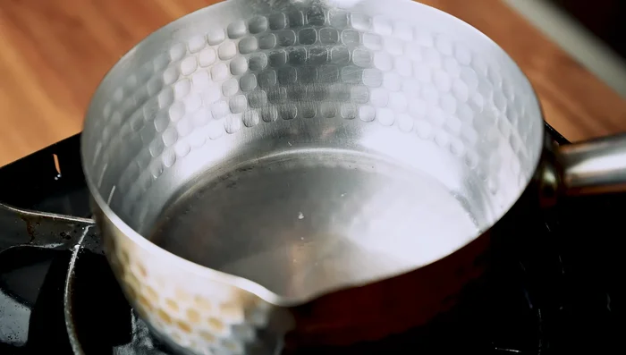 Heat dashi stock to 80°C (175-180°F). Add green tea bag and steep for 1-2 minutes. Remove tea bag and mix in soy sauce.