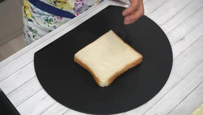 Slice bread in half.