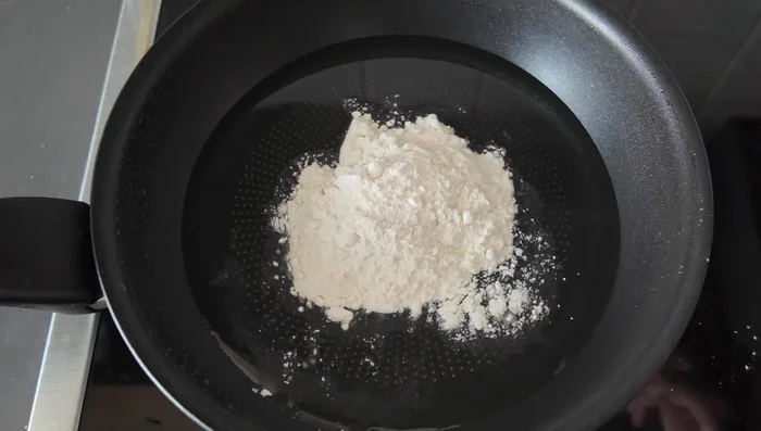 Add 3 tablespoons of flour (or potato starch/rice flour) to the oil and mix thoroughly. (It might look unusual, but it works!)