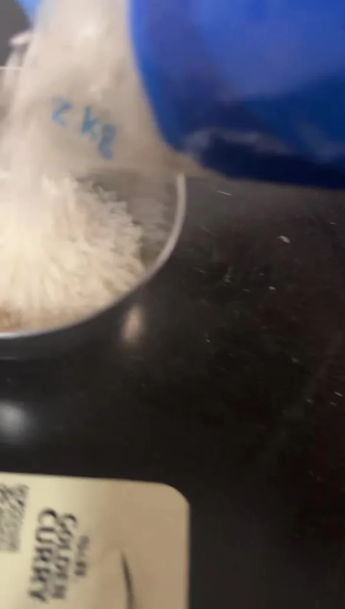 Cook Japanese rice according to package directions. Add a little hot water to the cooked rice to make it sticky.