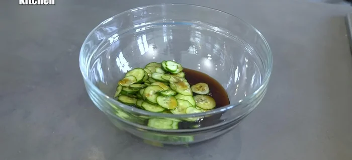 Soak the cucumber in the mentsuyu before it's diluted with water. This allows the flavors to blend and the cucumber releases juice.