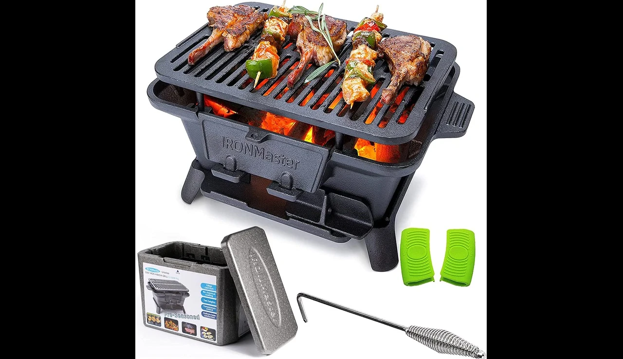 Close-up shot of the IronMaster Hibachi grill cooking steaks.